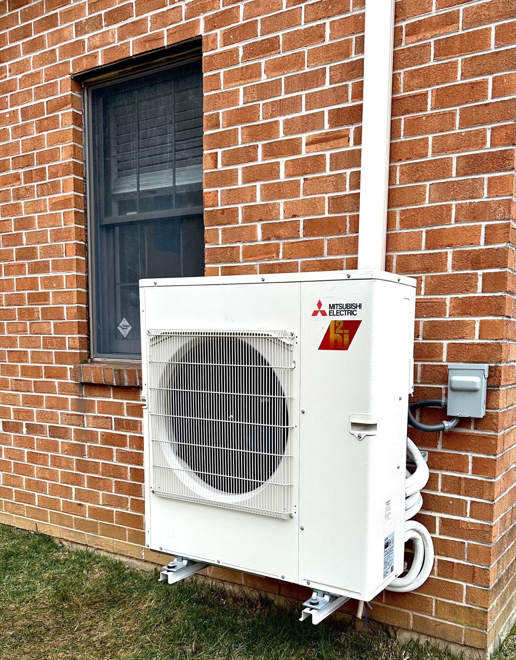 Technician fixing hvac unit