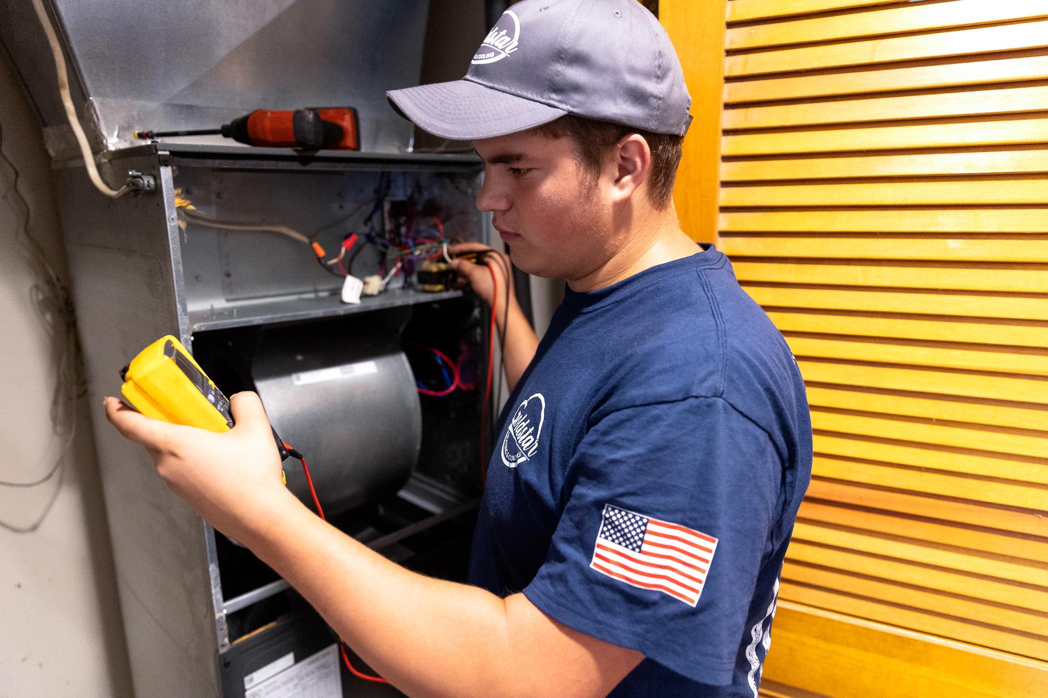 Technician working on furnace