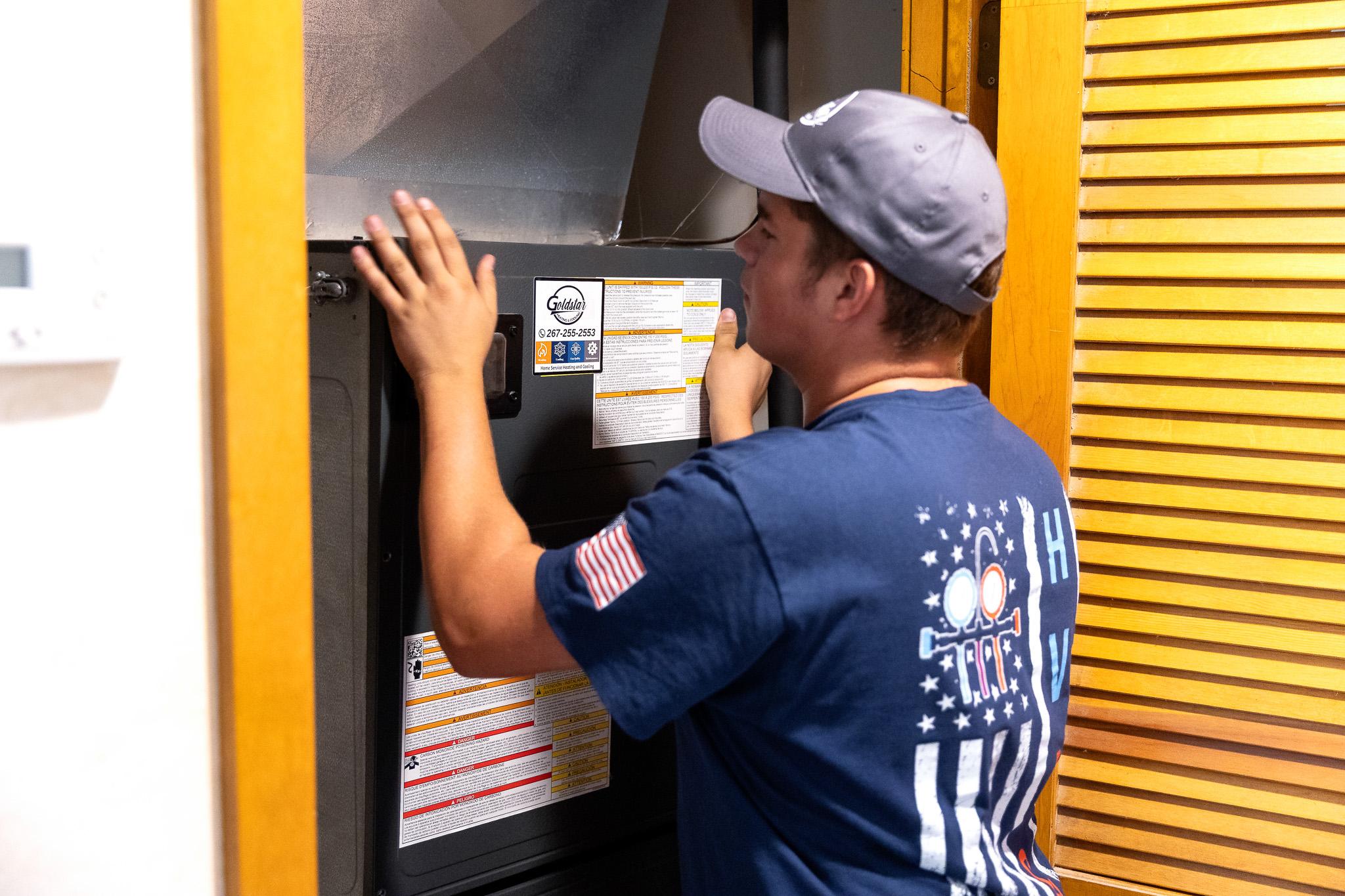 Technician working on furnace